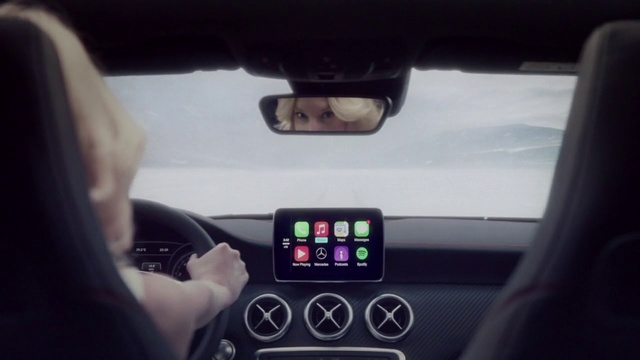 Video Reference: Vehicle, Driving, Car, Luxury vehicle, Technology, Electronic device, Hand, City car, Auto part, Person, Indoor, Front, Looking, Man, Holding, Small, View, Sitting, Black, Someone, Screen, White, Phone, Keyboard, Young, Mirror, Land vehicle, Automotive mirror, Rear-view mirror, Control panel