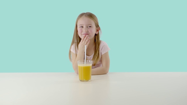 Video Reference: Orange juice, Child, Juice, Orange drink, Drink, Drinking, Blond, Smoothie, Toddler, Long hair