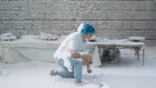 Video Reference: Snow, Freezing, Bricklayer, Winter, Person, Outdoor, Building, Man, Sitting, Wearing, Riding, White, Clothing