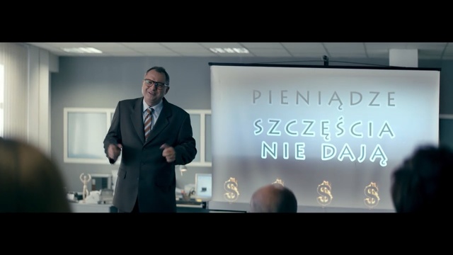 Video Reference: Presentation, Text, Suit, Font, Gentleman, Public speaking, Male, Display device, White-collar worker, Speech, Person