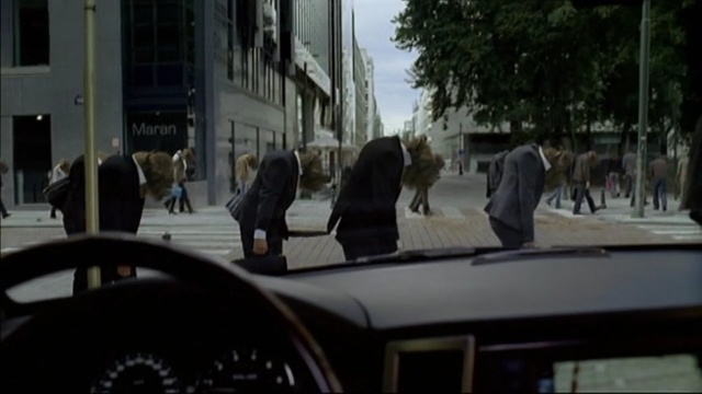 Video Reference: car, land vehicle, vehicle, luxury vehicle, mode of transport, family car, street, pedestrian, city car, sedan, Person