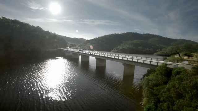 Video Reference: Water resources, Water, Bridge, River, Sky, Waterway, Reservoir, Beam bridge, Reflection, Bank