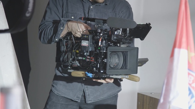 Video Reference: Camera, Cameras & optics, Camera operator, Cinematographer, Videographer, Filmmaking, Film camera, Photography, Camera accessory, Reflex camera, Person