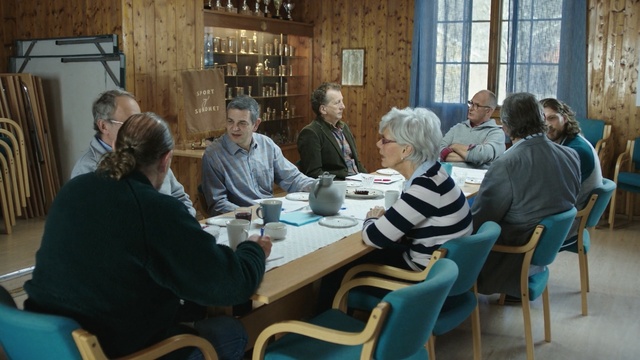 Video Reference: senior citizen, communication, conversation, table, meeting, lunch, Person