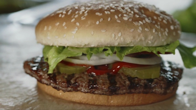 Video Reference: Food, Hamburger, Dish, Fast food, Buffalo burger, Cuisine, Veggie burger, Original chicken sandwich, Cheeseburger, Patty, Sandwich, Table, Sitting, Indoor, Paper, Bun, Meat, Plate, Large, Plastic, Close, Lettuce, Hotdog, Fries, Half, Cake, Donut, Cheese, Hot, Cut, White, Double, Stuffed, Snack food, Baked goods, Breakfast sandwich, Slider, Cemita, Hat, American food, Burger king premium burgers, Banh ma, Salmon burger, Chivito, Jucy lucy, Submarine sandwich, Breakfast roll, French fries, American cheese, Torta