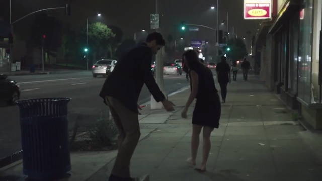 Video Reference: mode of transport, street, pedestrian, snapshot, night, road, interaction, darkness, midnight, girl, Person