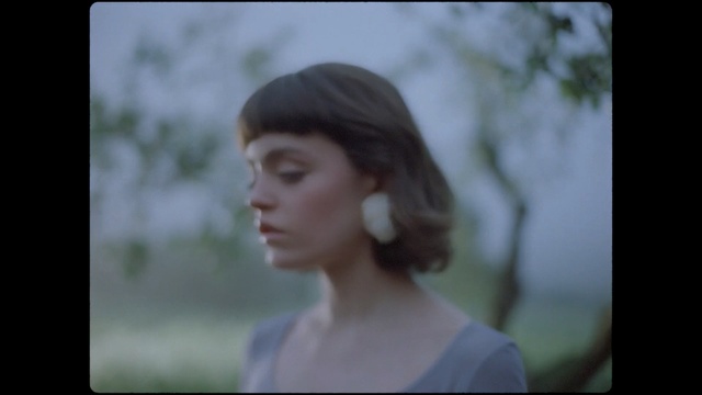 Video Reference: Hair, Face, Photograph, Facial expression, Portrait, Lady, Hairstyle, Head, Beauty, Nose, Person