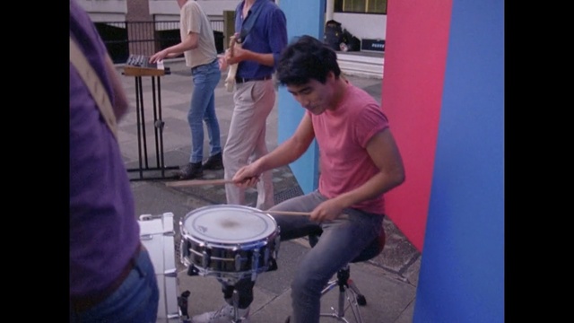 Video Reference: drum, musical instrument, drums, percussion, tom tom drum, bass drum, drummer, timbales, percussionist, snare drum, Person