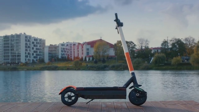 Video Reference: Land vehicle, Vehicle, Kick scooter, Mode of transport, Wheel, Scooter, Sailing, Motorized scooter, Automotive wheel system