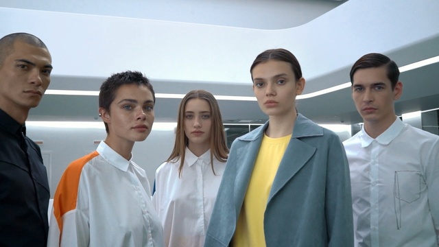 Video Reference: social group, white collar worker, uniform, team, suit, student, businessperson, formal wear, Person