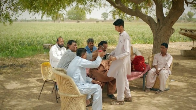 Video Reference: community, tree, temple, ritual, recreation, leisure, fun, family