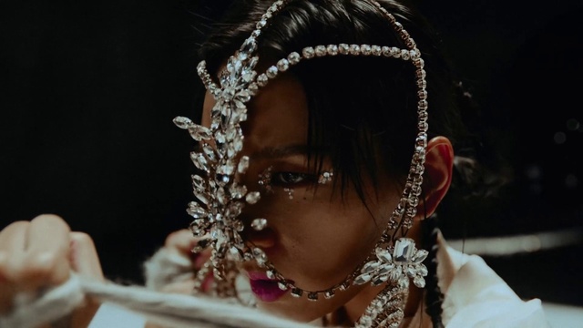 Video Reference: Headpiece, Child, Tradition, Jewellery, Headgear, Hand, Fashion accessory, Hair accessory, Black hair