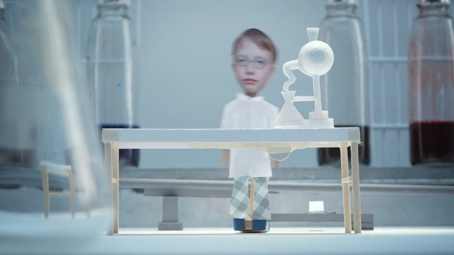 Video Reference: Table, Sitting, Furniture, Transparent material, Person