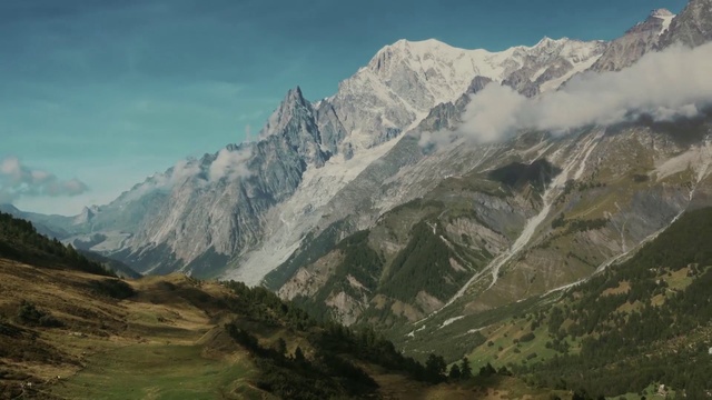 Video Reference: Mountainous landforms, Mountain, Mountain range, Highland, Nature, Ridge, Valley, Alps, Wilderness, Hill, Person