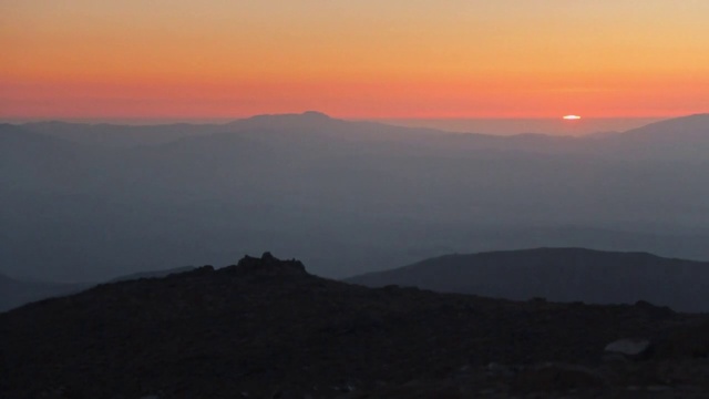 Video Reference: Sky, Mountainous landforms, Mountain, Highland, Horizon, Hill, Atmospheric phenomenon, Ridge, Sunset, Sunrise