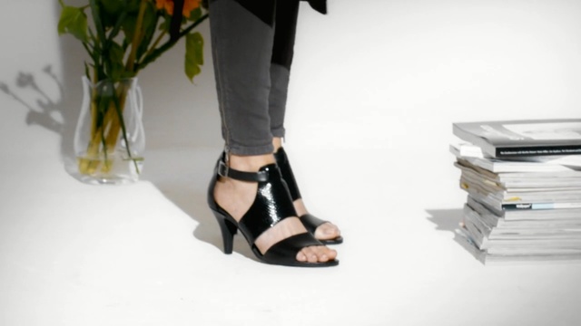 Video Reference: footwear, shoe, sandal, ankle, outdoor shoe, high heeled footwear, human leg, joint, Person