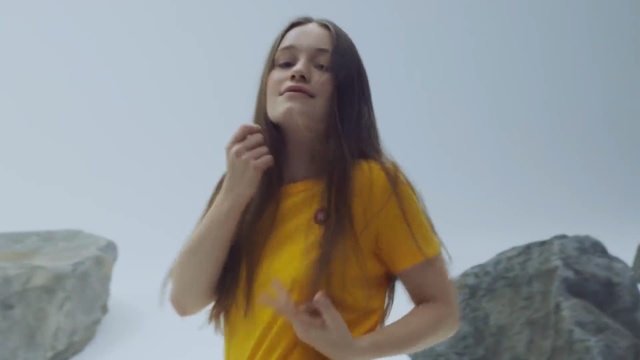 Video Reference: Yellow, Long hair, Arm, Mouth, Fun, Sitting, Neck, Happy, Smile, Black hair, Person