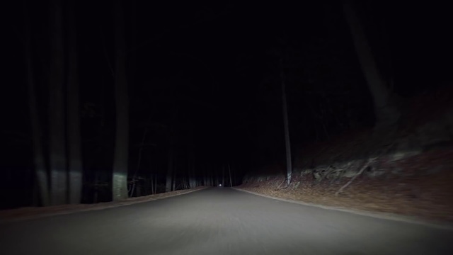 Video Reference: Black, Darkness, Night, Light, Road, Sky, Atmospheric phenomenon, Lighting, Atmosphere, Tree