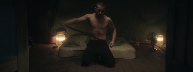 Video Reference: Barechested, Darkness, Male, Muscle, Human, Photography, Human body, Room, Leg, Night
