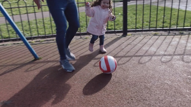 Video Reference: public space, play, ball, sports, ball, playground, net, structure, player, sport venue, Person