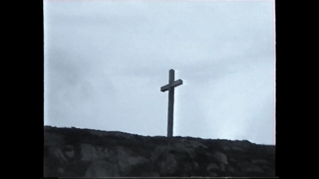 Video Reference: sky, cross, cloud, mode of transport, black and white, atmosphere, monochrome photography, meteorological phenomenon, symbol, monochrome