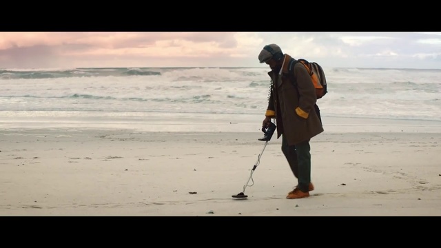 Video Reference: Shore, Coast, Natural environment, Standing, Beach, Human, Sea, Coastal and oceanic landforms, Ocean, Law enforcement