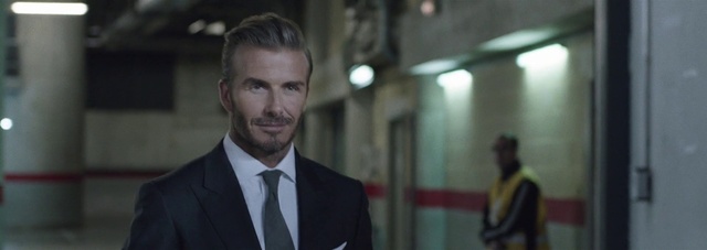 Video Reference: Suit, White-collar worker, Formal wear, Outerwear, Businessperson, Fictional character, Blazer, Tuxedo, Smile