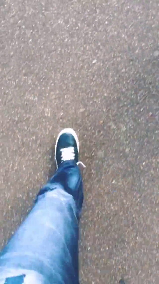 Video Reference: Footwear, Asphalt, Leg, Water, Ankle, Shoe, Human leg, Jeans, Foot, Road surface