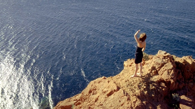 Video Reference: sea, cliff, rock, promontory, coast, sky, terrain, ocean, coastal and oceanic landforms, cape