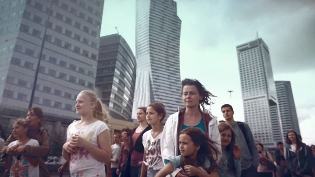 Video Reference: People, Photograph, Urban area, Social group, Crowd, Metropolitan area, Human settlement, City, Daytime, Snapshot