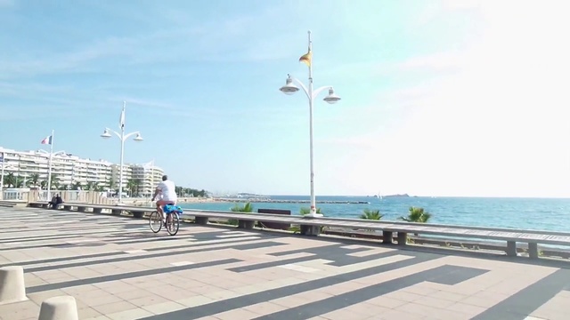 Video Reference: Boardwalk, Walkway, Pier, Sky, Sea, Nonbuilding structure, City, Vacation, Tourism