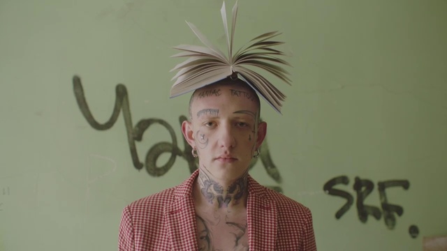 Video Reference: Hair, Forehead, Head, Hairstyle, Cool, Liberty spikes, Facial hair, Moustache, Fashion accessory