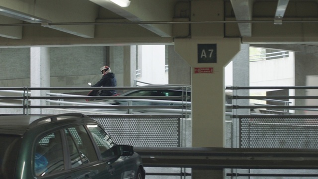 Video Reference: Parking, Vehicle, Car, Parking lot, Glass, Automotive window part, Architecture, Vehicle door, City, Building