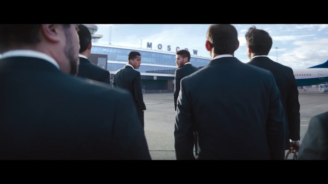 Video Reference: Suit, White-collar worker, Gentleman, Male, Businessperson, Formal wear, Tuxedo, Conversation, Screenshot, Gesture