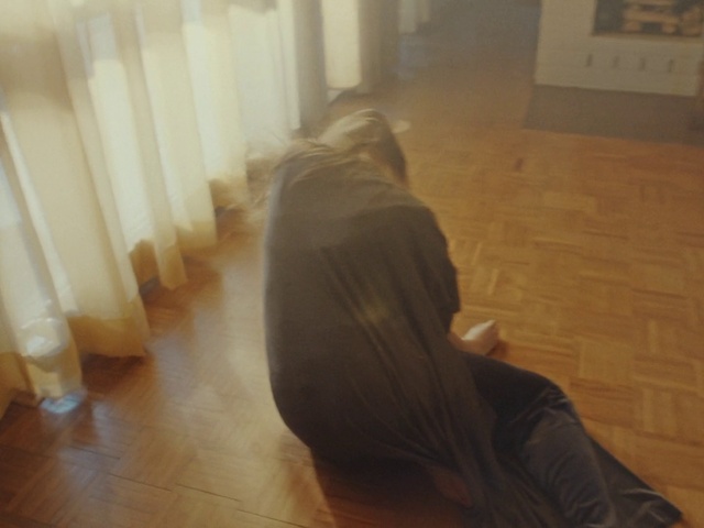 Video Reference: Floor, Hardwood, Light, Flooring, Wood, Wood flooring, Leg, Laminate flooring, Footwear, Sitting