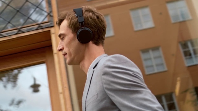 Video Reference: Hair, Hairstyle, Eyewear, Audio equipment, Ear, Neck, White-collar worker, Person