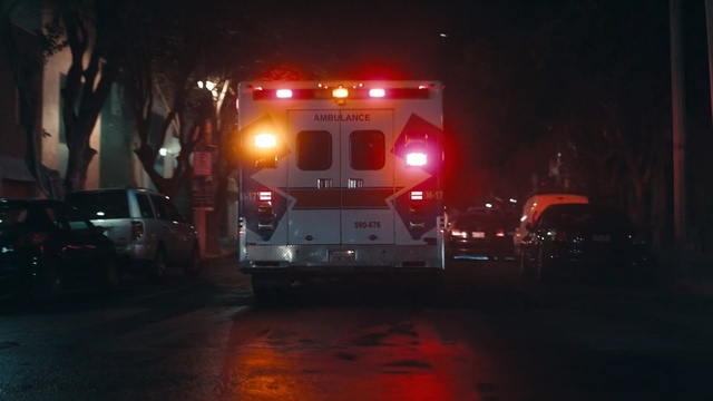 Video Reference: fire, night, mode of transport, light, darkness, evening, lighting, fire department, midnight, traffic, Person