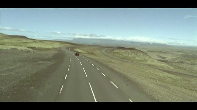 Video Reference: road, ecosystem, highway, steppe, mode of transport, ecoregion, infrastructure, road trip, sky, grassland