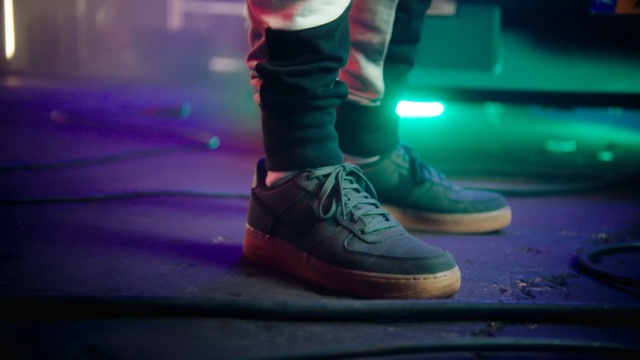 Video Reference: Footwear, Shoe, Green, Blue, Purple, Light, Standing, Sneakers, Performance, Leg, Person