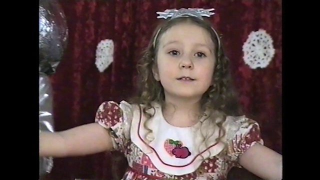 Video Reference: Headpiece, Hair accessory, Facial expression, Child, Tiara, Cheek, Smile, Fashion accessory, Headgear, Portrait