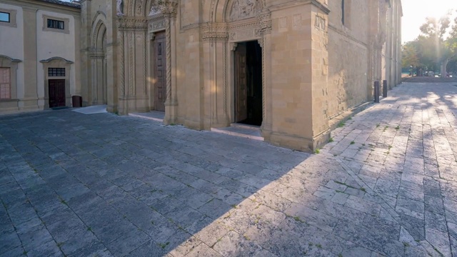 Video Reference: Floor, Flooring, Road surface, Cobblestone, Walkway, Architecture, Concrete, Driveway, Building, Sidewalk