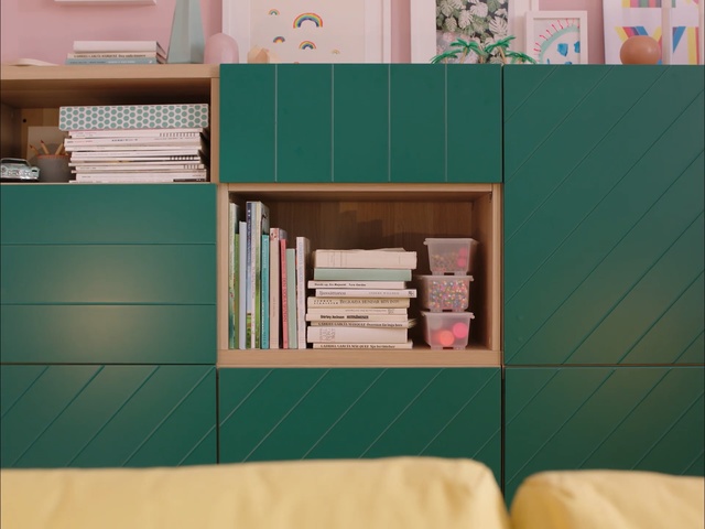 Video Reference: Shelf, Shelving, Turquoise, Bookcase, Furniture, Room, Interior design, Architecture, Floor, Table, Person