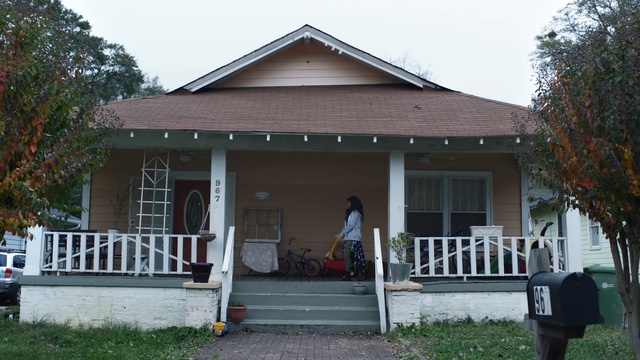 Video Reference: garage, house, architecture, bungalow, home, building, Person