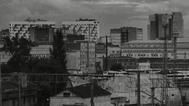 Video Reference: urban area, metropolis, black and white, cityscape, residential area, city, landmark, skyline, monochrome photography, metropolitan area, Person