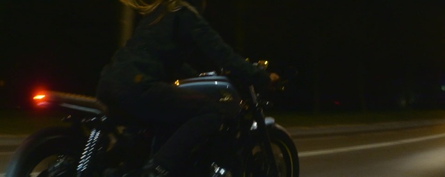 Video Reference: land vehicle, motorcycle, car, vehicle, night, mode of transport, motorcycling, light, darkness, automotive lighting