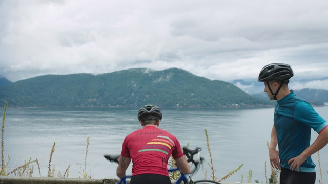 Video Reference: Cycling, Bicycle, Vehicle, Cycle sport, Recreation, Tourism, Sports equipment, Lake, Road bicycle, Cyclo-cross, Person