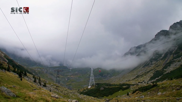 Video Reference: mountainous landforms, mountain range, cloud, sky, mountain, highland, hill station, valley, alps, ridge