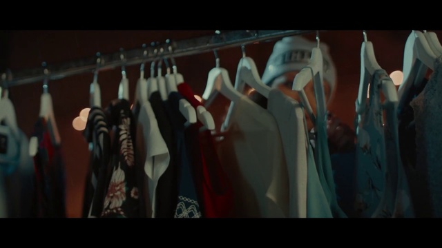 Video Reference: Fashion, Fiction, Room, T-shirt, Clothes hanger, Fictional character, Art, Stage