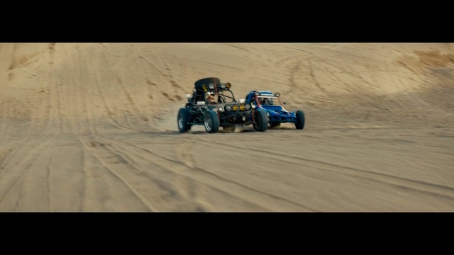 Video Reference: sand, mode of transport, desert, race track, landscape, dirt track racing, extreme sport, material, terrain, adventure