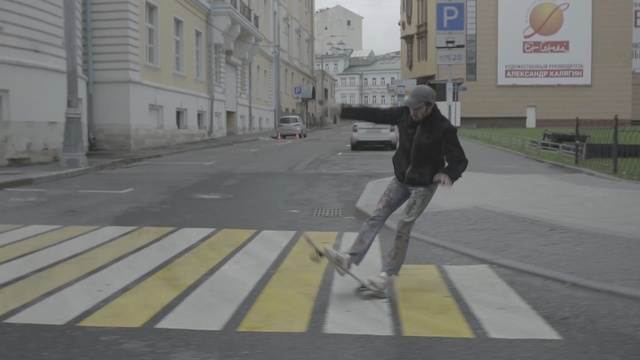 Video Reference: Pedestrian, Road, Zebra crossing, Sidewalk, Pedestrian crossing, Lane, Snapshot, Street, Infrastructure, Mode of transport, Person